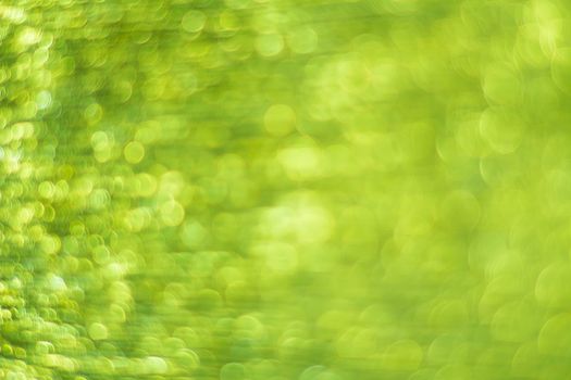 Green bokeh. Abstract background. Defocused lights.