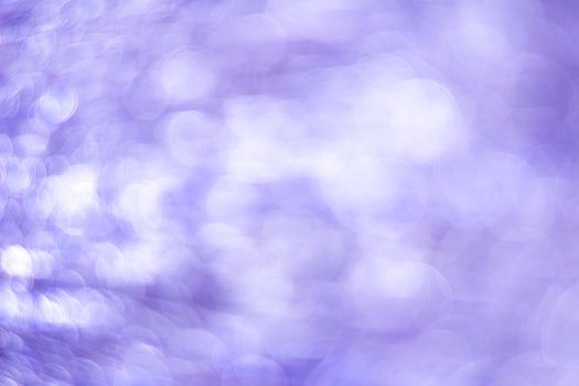 Violet bokeh. Abstract background. Defocused lights.