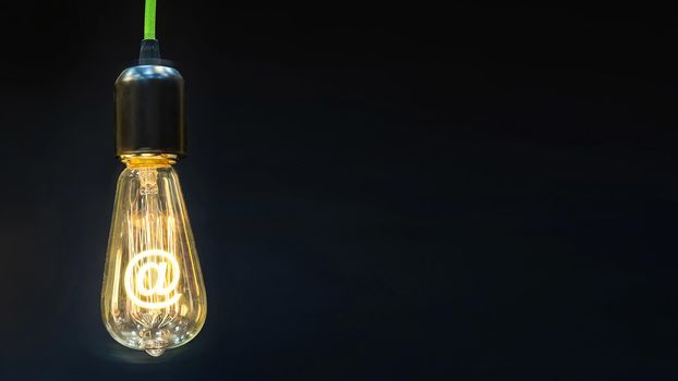 Bulb with glowing at mark inside of it, creativity concept.