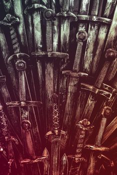 Metal knight swords background. Close up