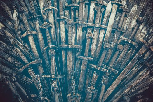 Metal knight swords background. Close up
