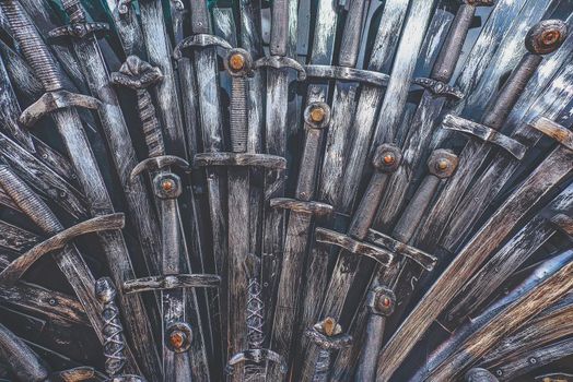 Metal knight swords background. Close up