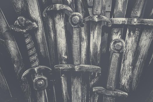 Metal knight swords background. Close up