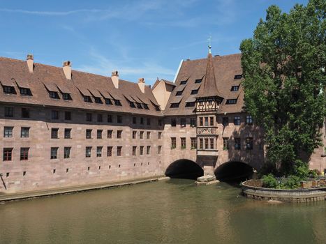 Heilig Geist Spital translation Holy Spirit Hospital on Pegnitz River in Nuernberg, Germany