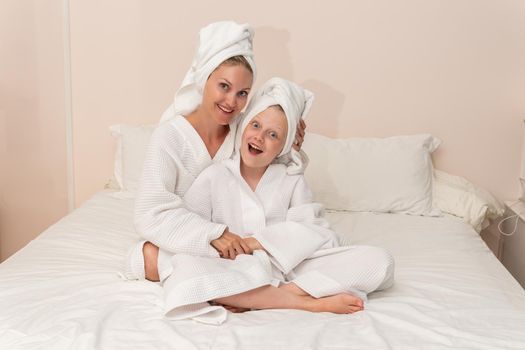 Daughter mom bath dries smiling love thinks elbows smile bed, from portrait cute in bathroom and shower beautiful, towel baby. Head funny fashion,