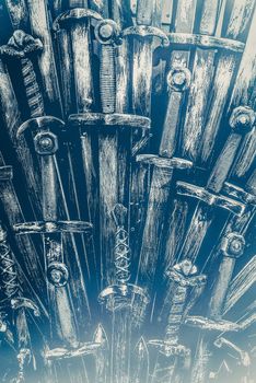 Metal knight swords background. Close up