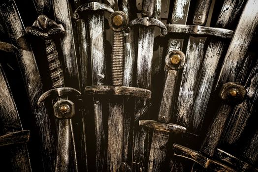 Metal knight swords background. Close up