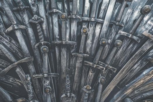 Metal knight swords background. Close up