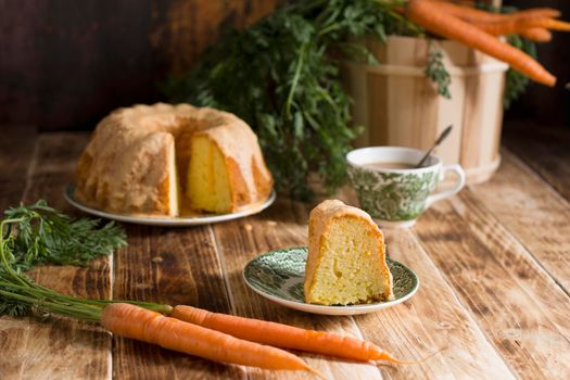 Sugar glazed carrot cake, homemade baked goods, rustic still life, national carrot cake day, cup of coffee. High quality photo