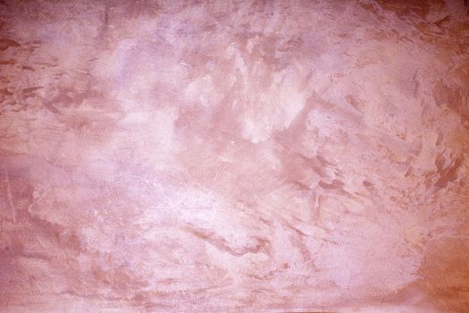 Pink colored abstract textured background.