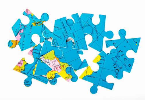 Concept of Globalization. Earth puzzle on white background