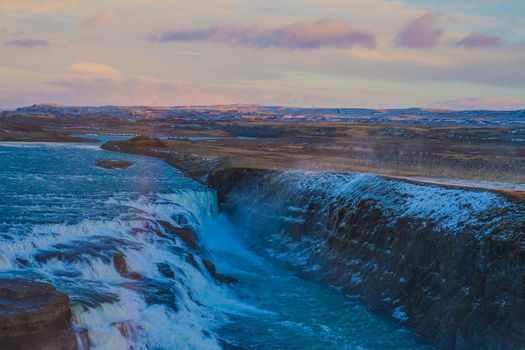 Gotorphoss waterfall and morning ray. Shooting Location: Iceland