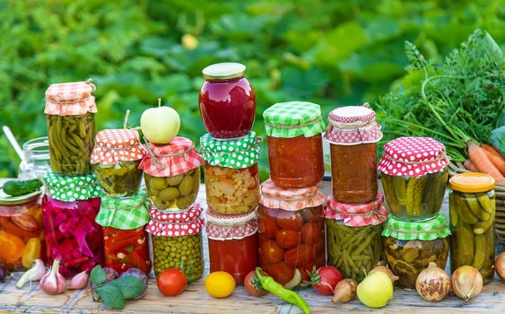 Jars with preserved vegetables for the winter. Selective focus. Food.