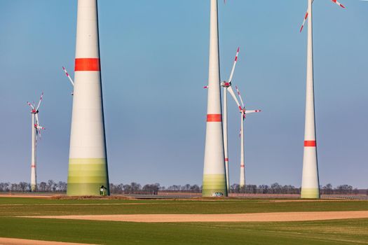 The massive towers of many wind turbines destroy the landscape in Germany