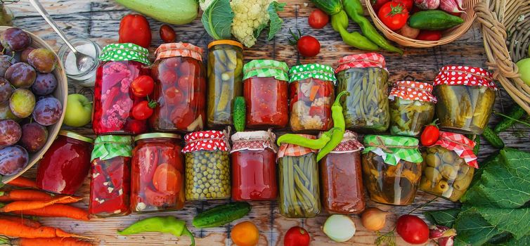 Jars with preserved vegetables for the winter. Selective focus. Food.