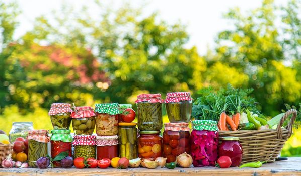 Jars with preserved vegetables for the winter. Selective focus. Food.