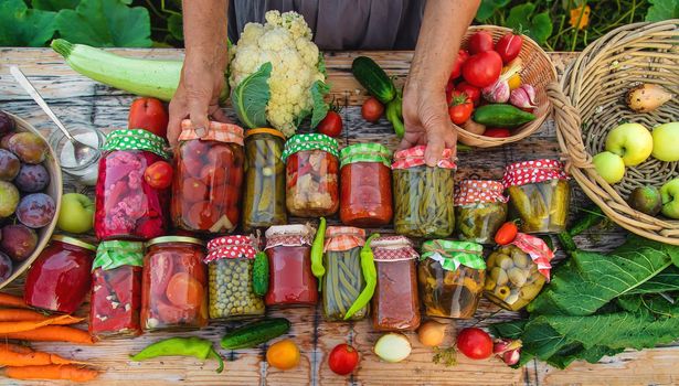 Jars with preserved vegetables for the winter. Selective focus. Food.