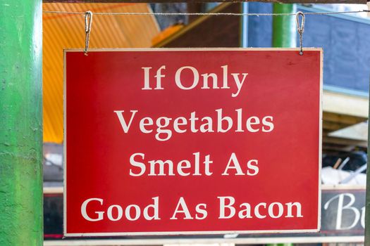 If only vegetables smelt as good as bacon market sign