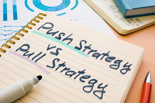 Push strategy vs pull strategy phrase in a notebook.