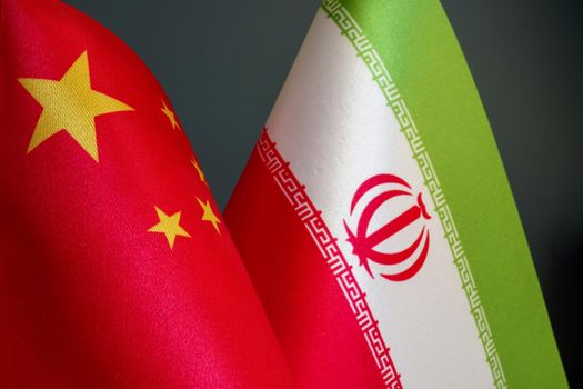 Small Flags of Iran and China side by side.