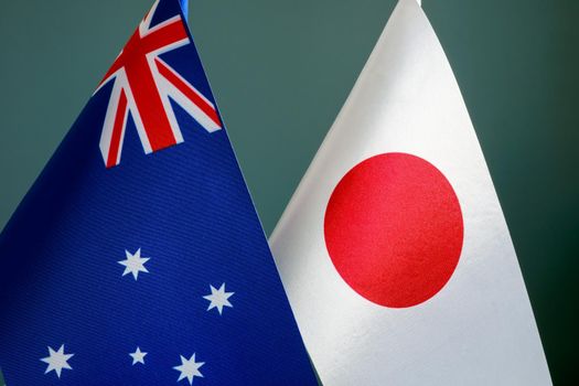 Closeup of the flags of Japan and Australia.