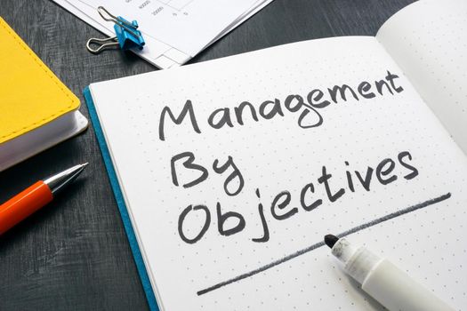 Management by objectives mark in an open notepad.