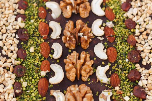 oriental sweetness from walnuts, cashews, almonds, chocolate. View from above.