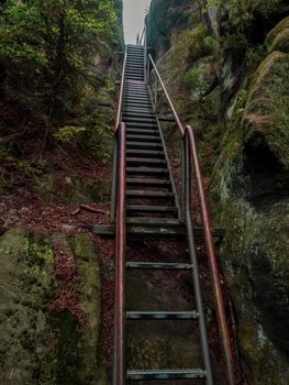 View metal stairs of the Staircase or Heilige Stiege, the view leads to tourist trails. Germany, Saxony, Elbe Sandstone Mountains, Bad Schandau and Schmilka region