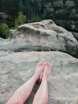 Bare foot with rocky mountain nature background, relax travel concept. And fun