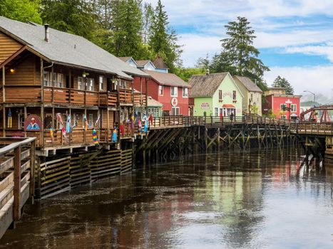 Ketchikan, AK - 10 June 2022: Famous Creek Street boardwalk and shops in Ketchikan Alaska