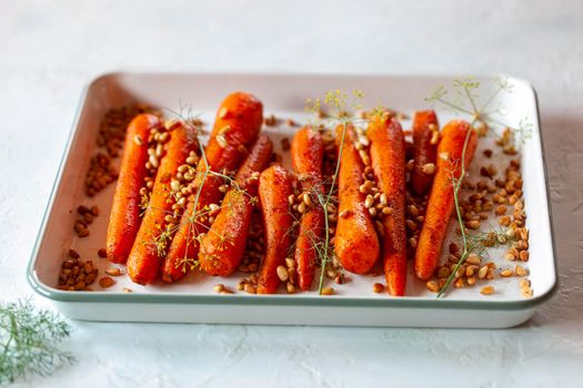 Lebanese-style carrots prepared with pine nuts and cumin