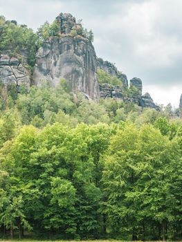 Panorama with Group of rocks Schrammsteine and Falkenstein seen from valley bello, Saxon Switzerland. Saxony Germany