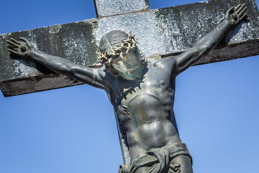 Jesus Christ crucified with crown of thorns sacrificed himself for save us
