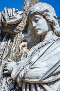 Seraphim angel praying for forgiveness and hope of better days to come