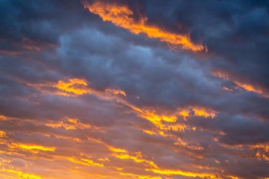 Dramatic sky at sunset with fire and storm cloudscape, Miami, Florida, United States