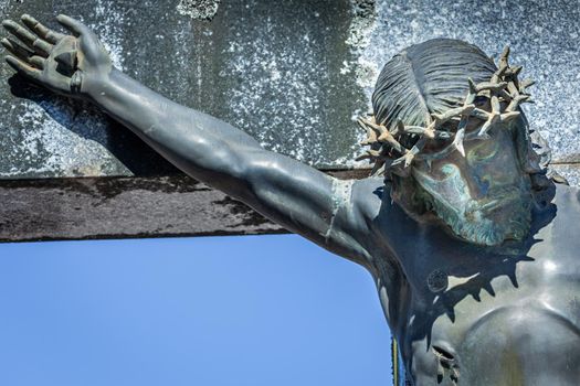 Jesus Christ crucified with crown of thorns sacrificed himself for save us