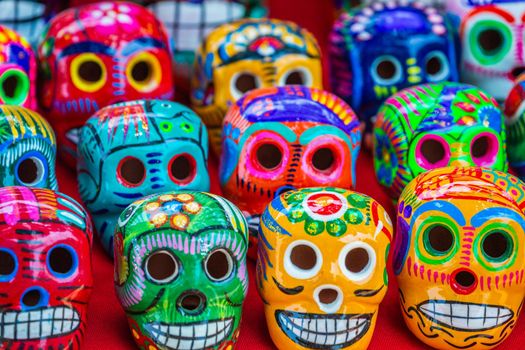 Colorful skulls souvenirs for day of the dead celebration, Cancun, Mexico