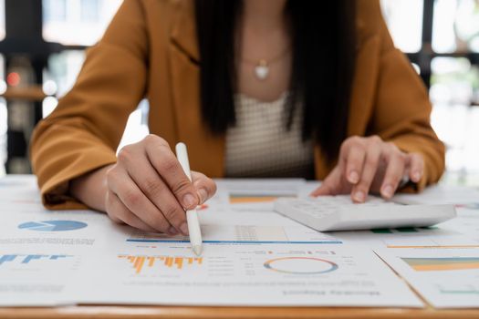 accountant calculating business data, accountancy document at office, business concept.