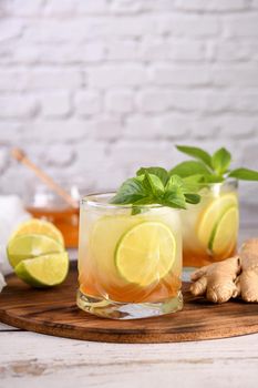   Refreshment organic non-alcohol cocktail. Honey ginger lemonade with a touch of basil flavor