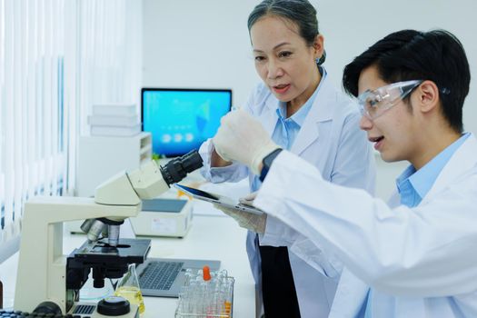 medical research laboratories, scientists analyze chemical samples Discuss technological innovations. Advanced scientific laboratories for medicine, biotechnology