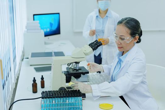 medical research laboratories, scientists analyze chemical samples Discuss technological innovations. Advanced scientific laboratories for medicine, biotechnology