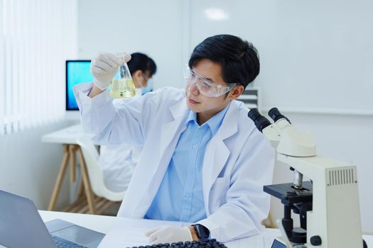 medical research laboratories, scientists analyze chemical samples Discuss technological innovations. Advanced scientific laboratories for medicine, biotechnology