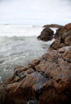 salvador, bahia / brazil - november 3, 2019: Oil macha is seen on the Rio Vermelho beach in Salvador. The site was affected by oil spills on the Brazilian coast.