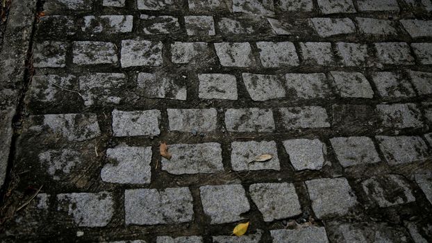 salvador, bahia / brazil - june 13, 2020: pavement made with cobblestone is seen in a condominium in the city of Salvador.