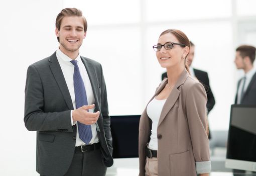 business partners standing in a modern office.concept of cooperation