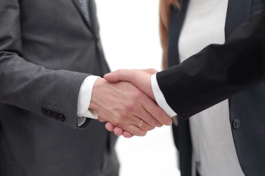 Two Confident businessman shake hands with each other