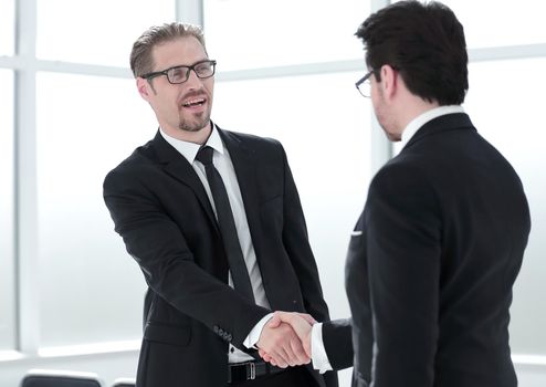 CEO shaking hand to new employee