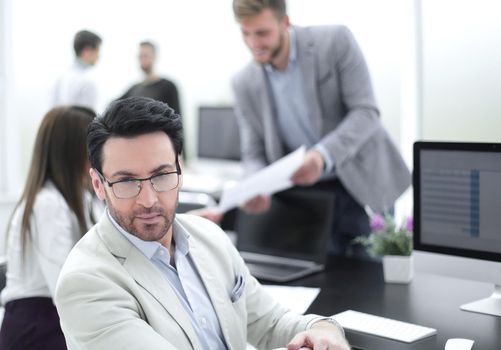 businessman sitting at the office Desk.business concept