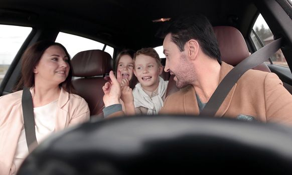 happy family travelling by car.family holiday concept