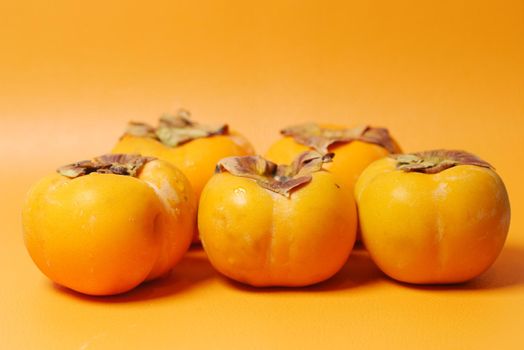 top view of persimmon on white background ,